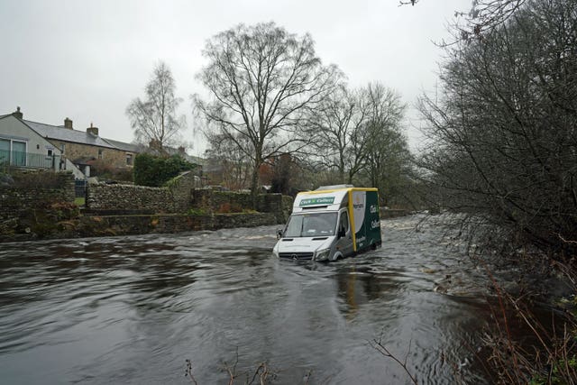 A supermarket delivery van in the River Wear