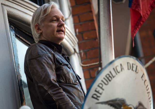 Julian Assange speaks from the balcony of the Ecuadorian embassy