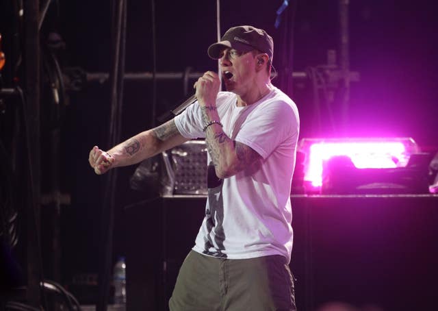 Eminem on stage at the Reading Festival 2013