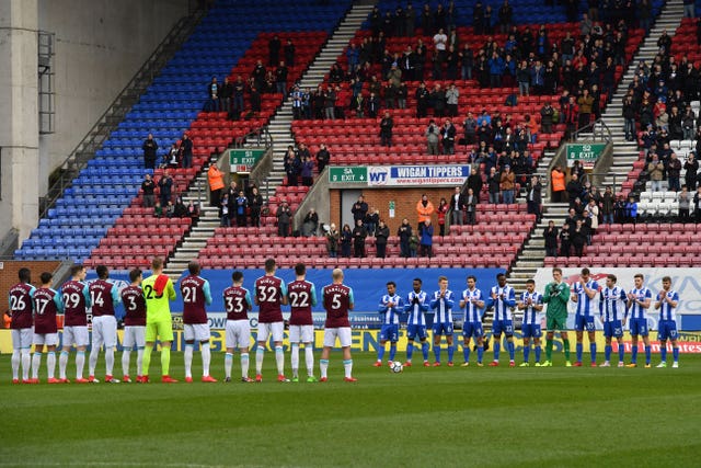 A minute's applause  before the FA Cup tie between Wigan and West Ham at the DW Stadium