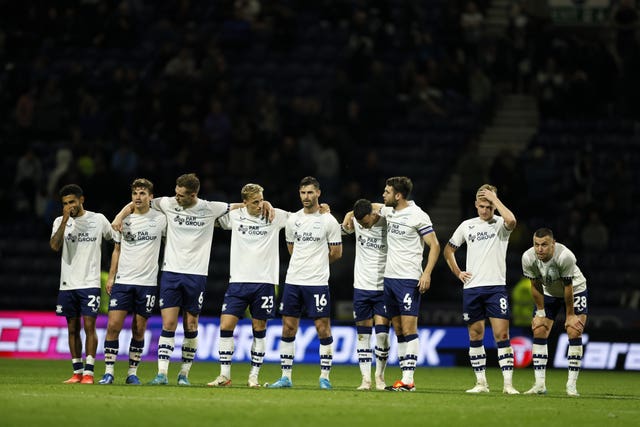 Preston line up for their penalty shoot-out against Fulham