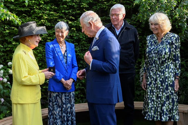 The King and Queen Camilla speak to Janet Fookes (left), Piet Oudolf and Judy Ling Wong after awarding them with the Elizabeth Medal of Honour Award in the Royal Horticultural Society Garden of Royal Reflection and Celebration during a visit to the RHS Chelsea Flower, at the Royal Hospital Chelsea, London 