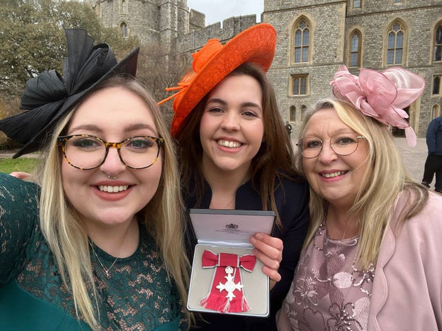 Charlotte Nichols  (centre) with sister Ciara (left) and mother Sally after the ceremony 