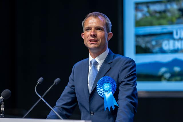  Andrew Bowie speaking on stage