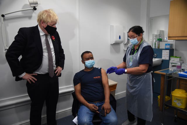 Prime Minister Boris Johnson met Arzou Miah, who received his booster jab