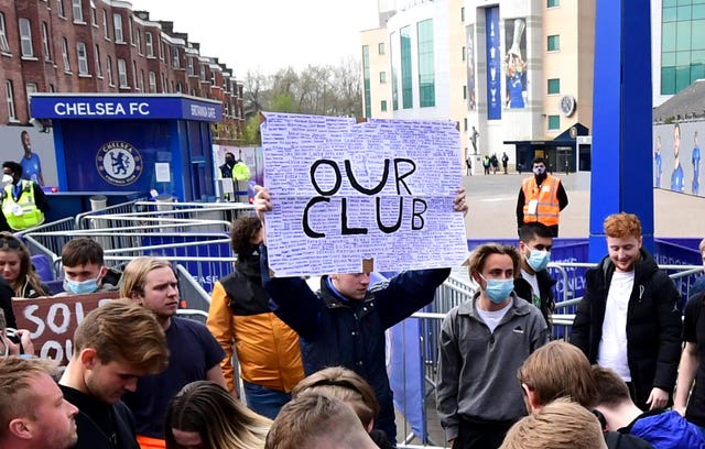 Fans protest against Chelsea's involvement in the new European Super League outside Stamford Bridge, London. Picture date: Tuesday April 20, 2021.