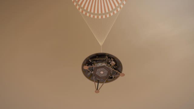 An artist's impression of the InSight lander touching down on Mars