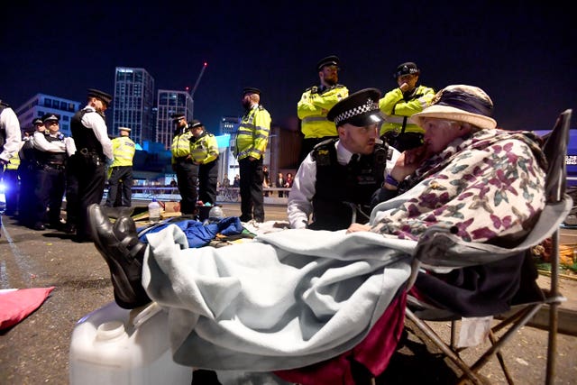 Police remove Extinction Rebellion demonstrators from Waterloo Bridge in London