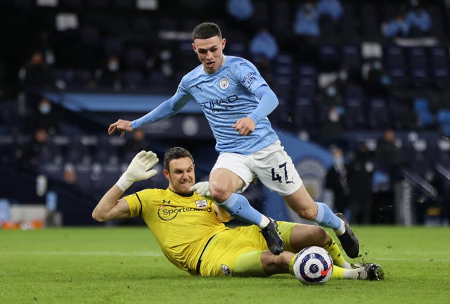 Phil Foden should have been awarded a penalty when he was caught by Southampton goalkeeper Alex McCarthy but stayed on his feet, referees' chief Mike Riley said