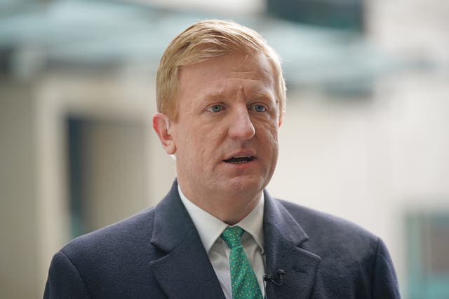 Deputy Prime Minister Oliver Dowden speaks to the media as he arrives at BBC Broadcasting House in London 
