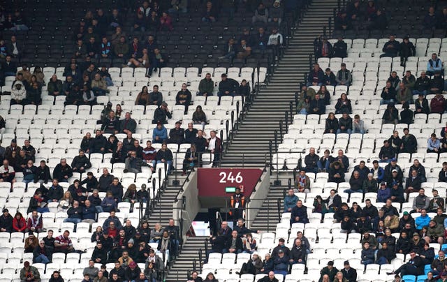Empty seats in the stand as West Ham fans leave early during defeat to Arsenal
