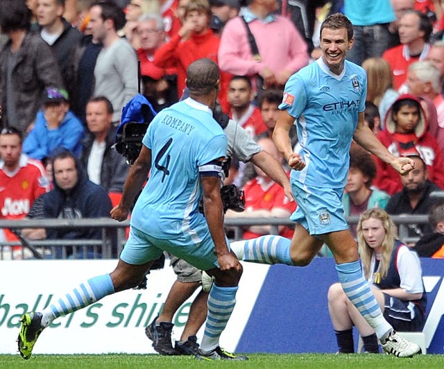 Edin Dzeko (right) scored City's second goal