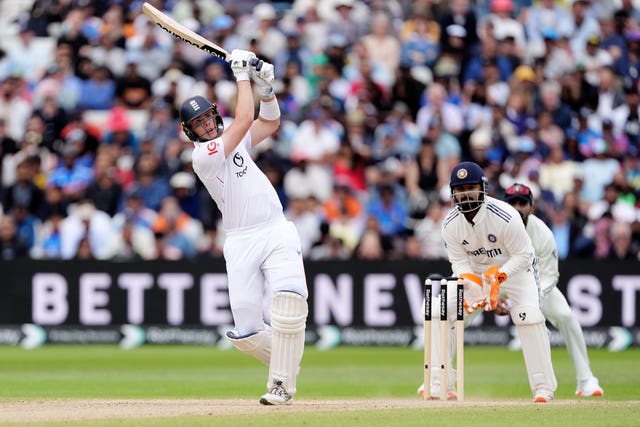 England's Jamie Smith hits a boundary for six 