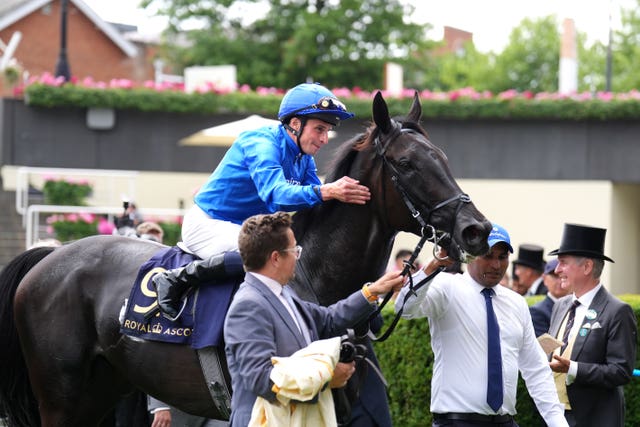 Rebel's Romance and William Buick return to the winner's enclosure 