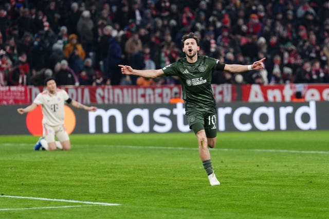 Nicolas Kuhn peels away in celebration after scoring for Celtic against Bayern Munich