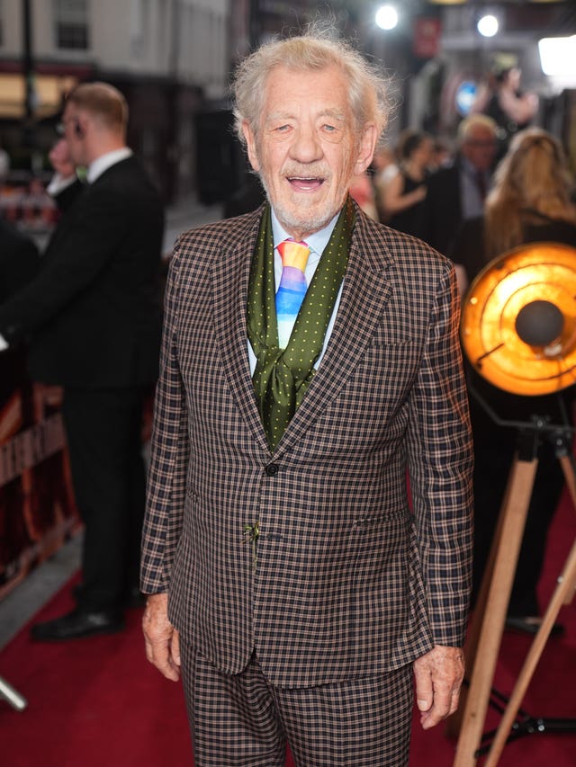 Sir Ian McKellen in a grey suit