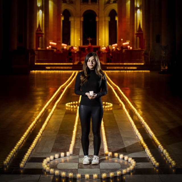 Holly Wilson, whose grandmother Ada Wilson died during the pandemic, in Belfast Cathedral before a remembrance service