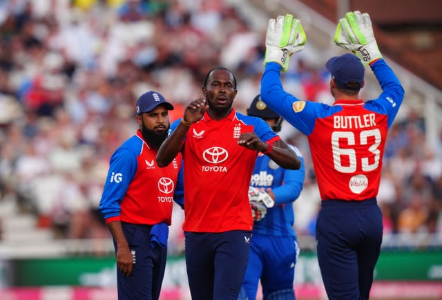 England’s Jofra Archer, centre, celebrates with wicketkeeper Jos Buttler, right, after having Vaibhav Sooryavanshi caught behind