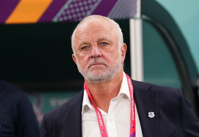 Graham Arnold in the dugout during his time as Australia coach
