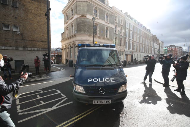 A police van arrives at Westminster Magistrates’ Court on Saturday morning