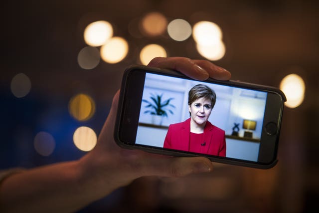 Sturgeon speech at SNP conference on a phone