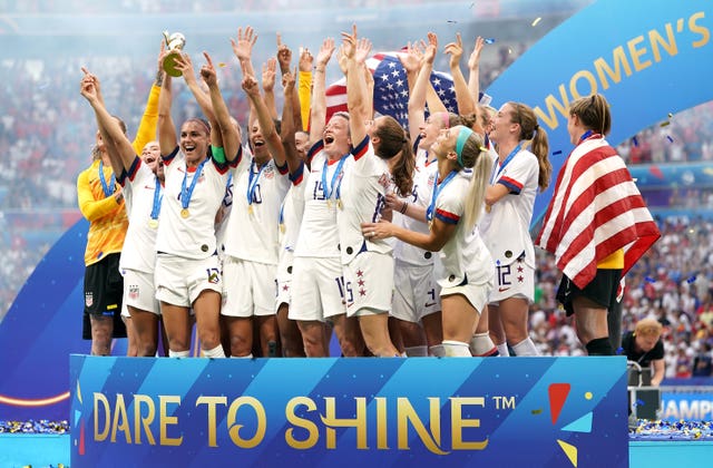 USA’s Megan Rapinoe (centre) and her team-mates celebrate their 2019 World Cup win