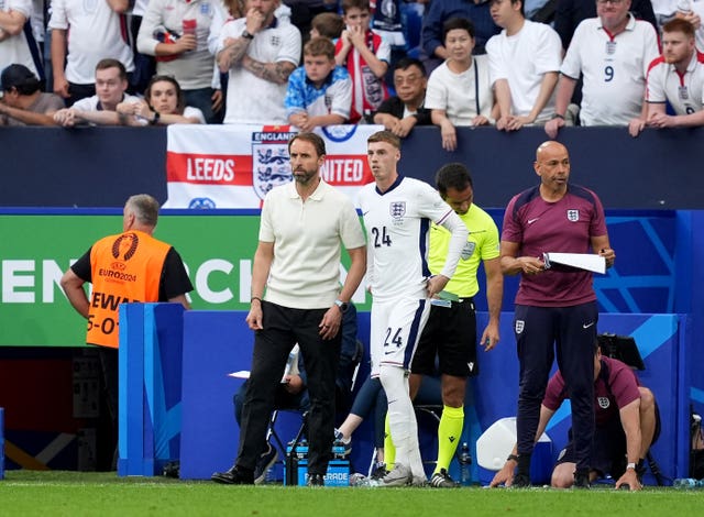 England manager Gareth Southgate (left) and Cole Palmer on the touchline at Euro 2024