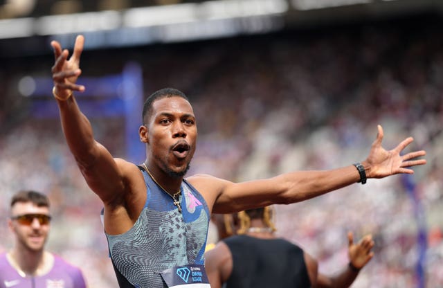 Zharnel Hughes reacts after setting a new national record