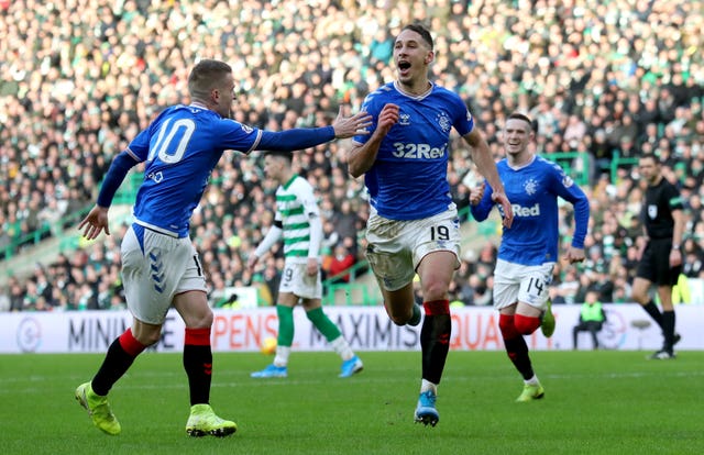 Nikola Katic (centre) celebrates