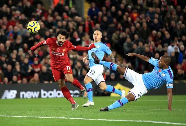 Liverpool’s Mohamed Salah (left) scores his side’s second goal of their 3-1 victory against Manchester City