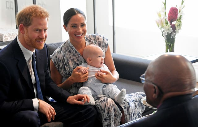 Harry and Meghan and their son Archie in 2019
