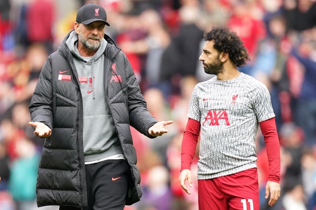 Mohamed Salah, right, listens to Liverpool manager Jurgen Klopp