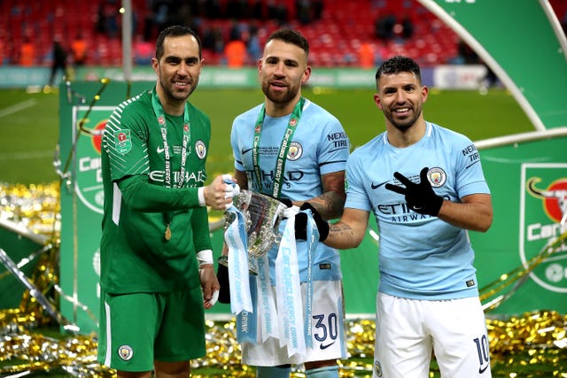 Bravo (left) helped City win the Carabao Cup last season