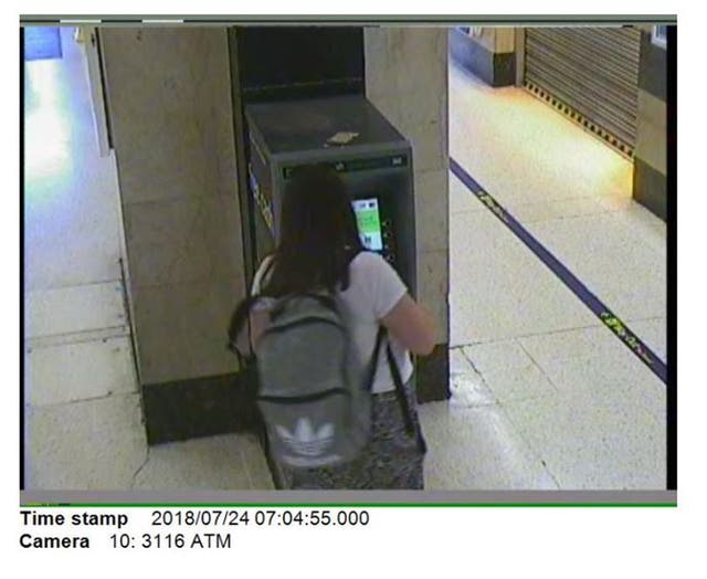 Jenny McDonagh withdrawing cash from an ATM 