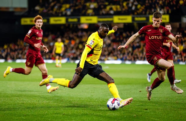 Watford's Ken Sema looks to cross the ball under pressure from the Norwich defence