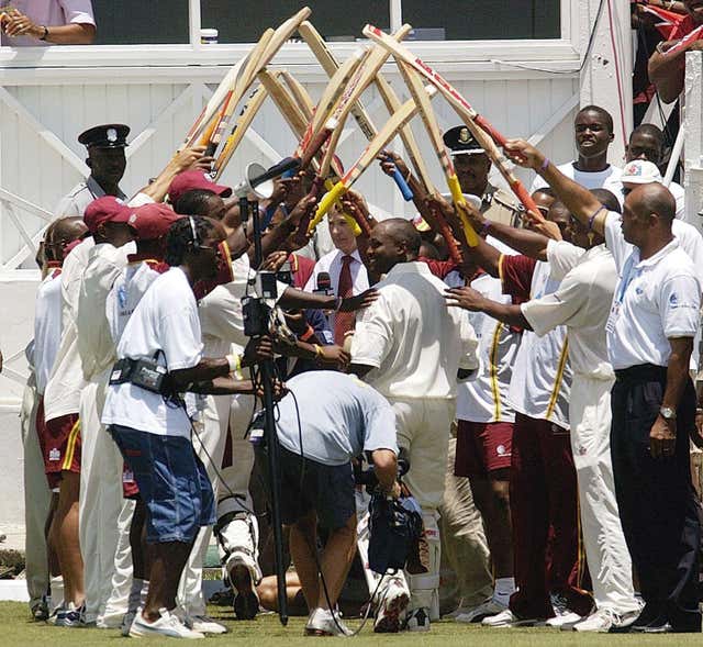 Brian Lara is given a guard of honour after his record-breaking feat 