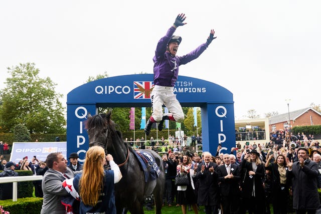 Frankie Dettori jumps off of King Of Steel after winning the 2023 Qipco Champion Stakes at Ascot 