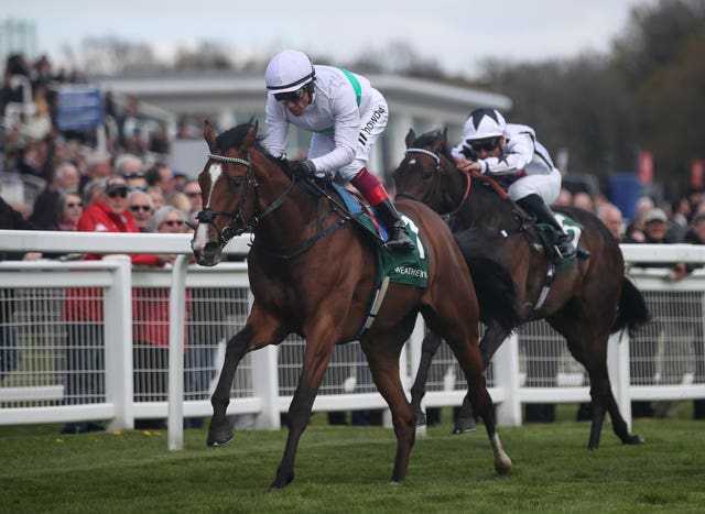 Epictetus and Frankie Dettori (left) coming home to win the Weatherbys Digital Solutions Blue Riband Trial at Epsom Downs