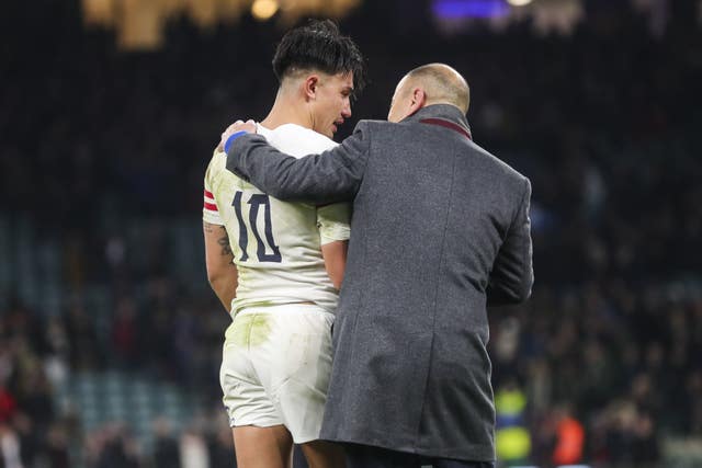 Eddie Jones (right) backed the decision for Marcus Smith (left) to kick the ball out at the end