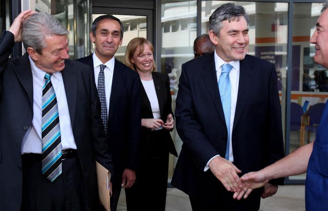 Britain’s Prime Minister Gordon Brown walks alongside Health Minister Lord Ara Darzi after a visit to Basildon Hospital, Cardiothoracic centre, Basildon, Essex (Chris Radburn/PA)