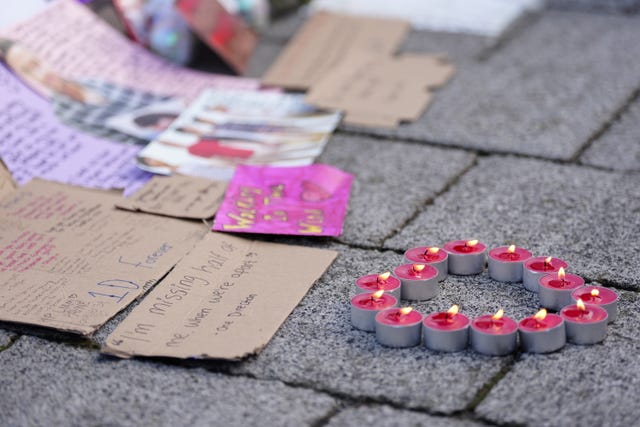 Candles laid in a heart shape at the Keel Warf Bridge at Royal Albert Dock in Liverpool 