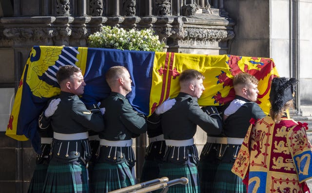 Queen's coffin being carried out of St Giles' Cathedral