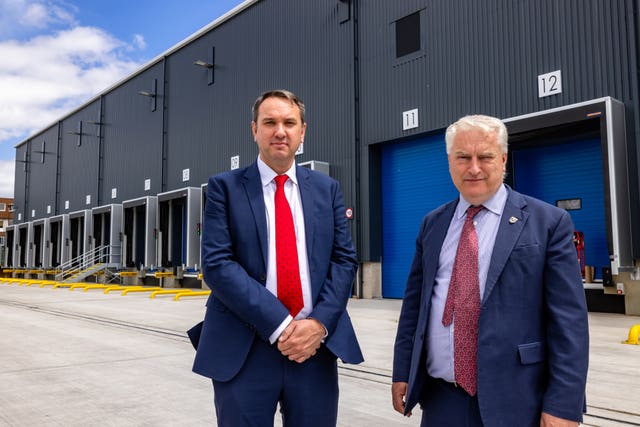 Richard Ballantyne, British Ports Association chief executive, left, and Gerald Vernon-Jackson, the Liberal Democrat leader of Portsmouth City Council, outside the new border control post built to handle inspections on animal products and plant and forest products coming from the European Union