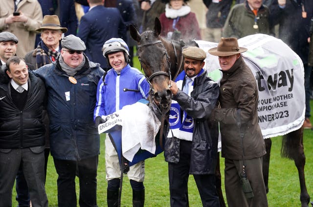 Team Energumene celebrate in the winner's enclosure 