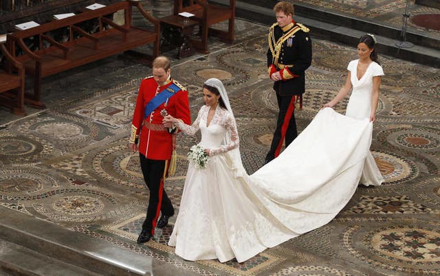 Prince William and his bride Kate, followed by best man Prince Harry and maid of honour Pippa Middleton (Kirsty Wigglesworth/PA)