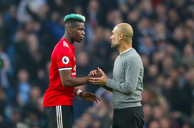 aul Pogba, left, and Pep Guardiola shake hands after the final whistle 