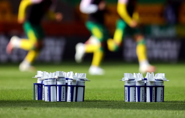 Water bottles on a football pitch