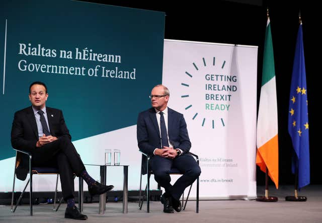 Mr Varadkar (left) and Mr Coveney on stage at the Convention Centre