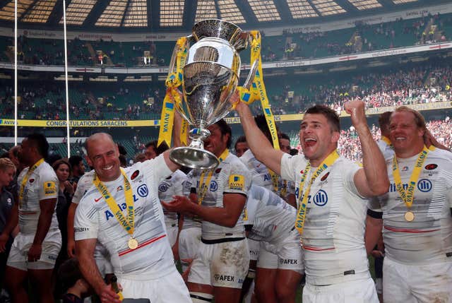 Richard Wigglesworth celebrates with Charlie Hodgson after Saracens' victory in the Aviva Premiership Final at Twickenham.