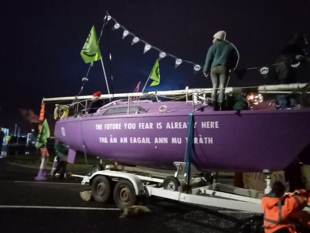 Activists blocking the gates with boats